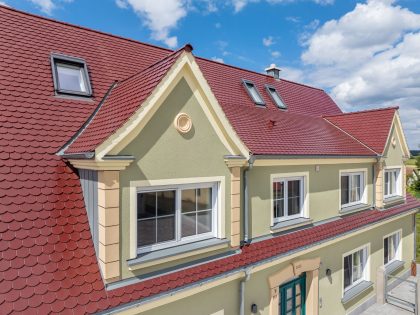 Saniertes Einfamilienhaus mit Biberschwanzziegel Rundschnitt in edelrosso