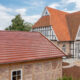 Solar tile Stylist-PV with Autarq on barn with half-timbering and clinker façade.