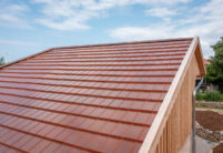 Solar tile Stylist-PV with Autarq on barn with half-timbering and clinker façade.