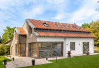 Modern house with modern, natural red roof tile Walther Stylist