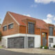 Detached house with wooden elements and the WALTHER Stylist flat tile in red-brown on the roof