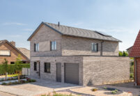 Inspiring, beautiful clinker brick house with flat tiles laid in rows in noble slate