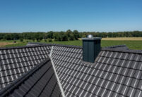 Great clinker brick house with Z7v reform tiles on a pitched roof with large dormers