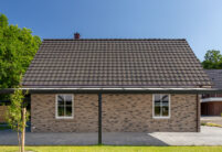 Reform tiles on an imposing clinker brick house