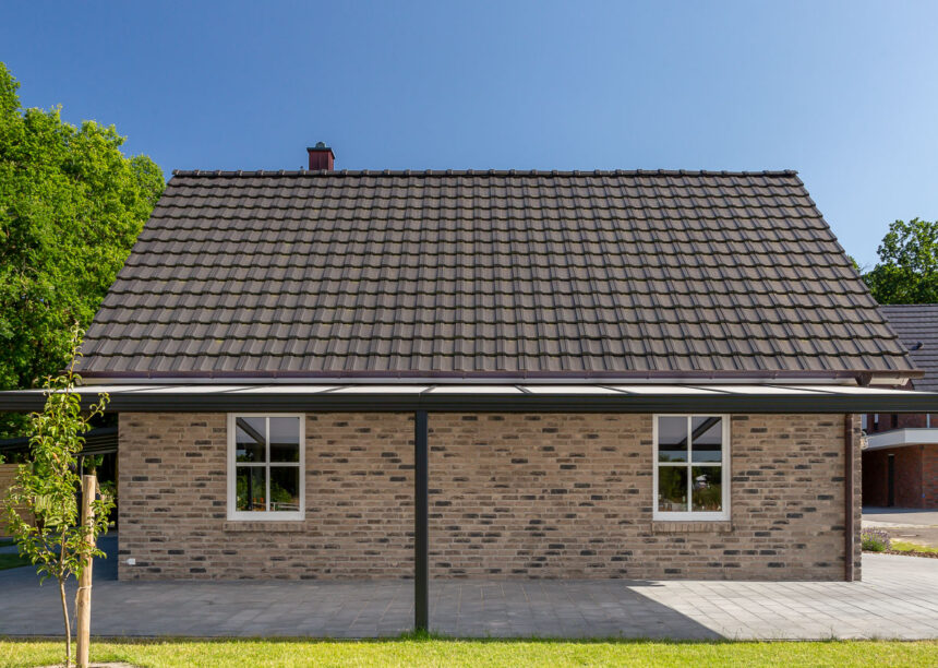 Reform tiles on an imposing clinker brick house