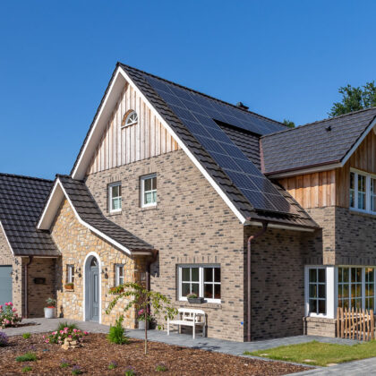 Reform tiles on an imposing clinker brick house