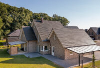 Reform tiles on an imposing clinker brick house